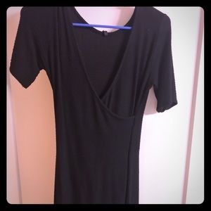 Black 3/4 length sleeve faux wrap bodycon dress